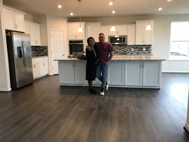 Couple in the kitchen of their new home